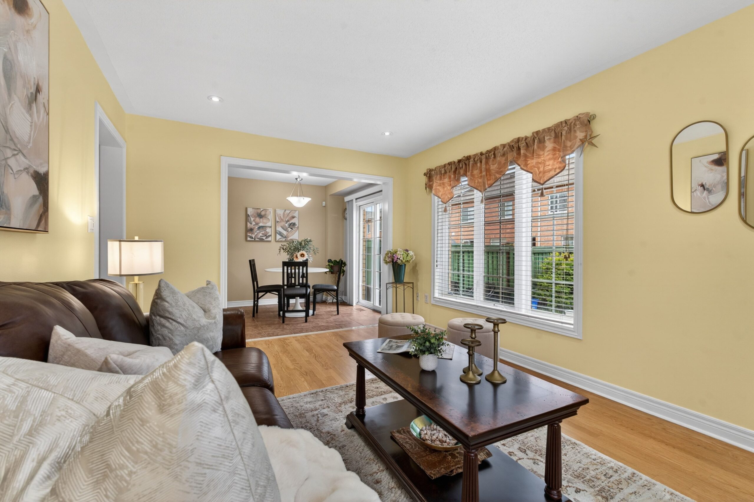Living room with dining area view in a GTA home