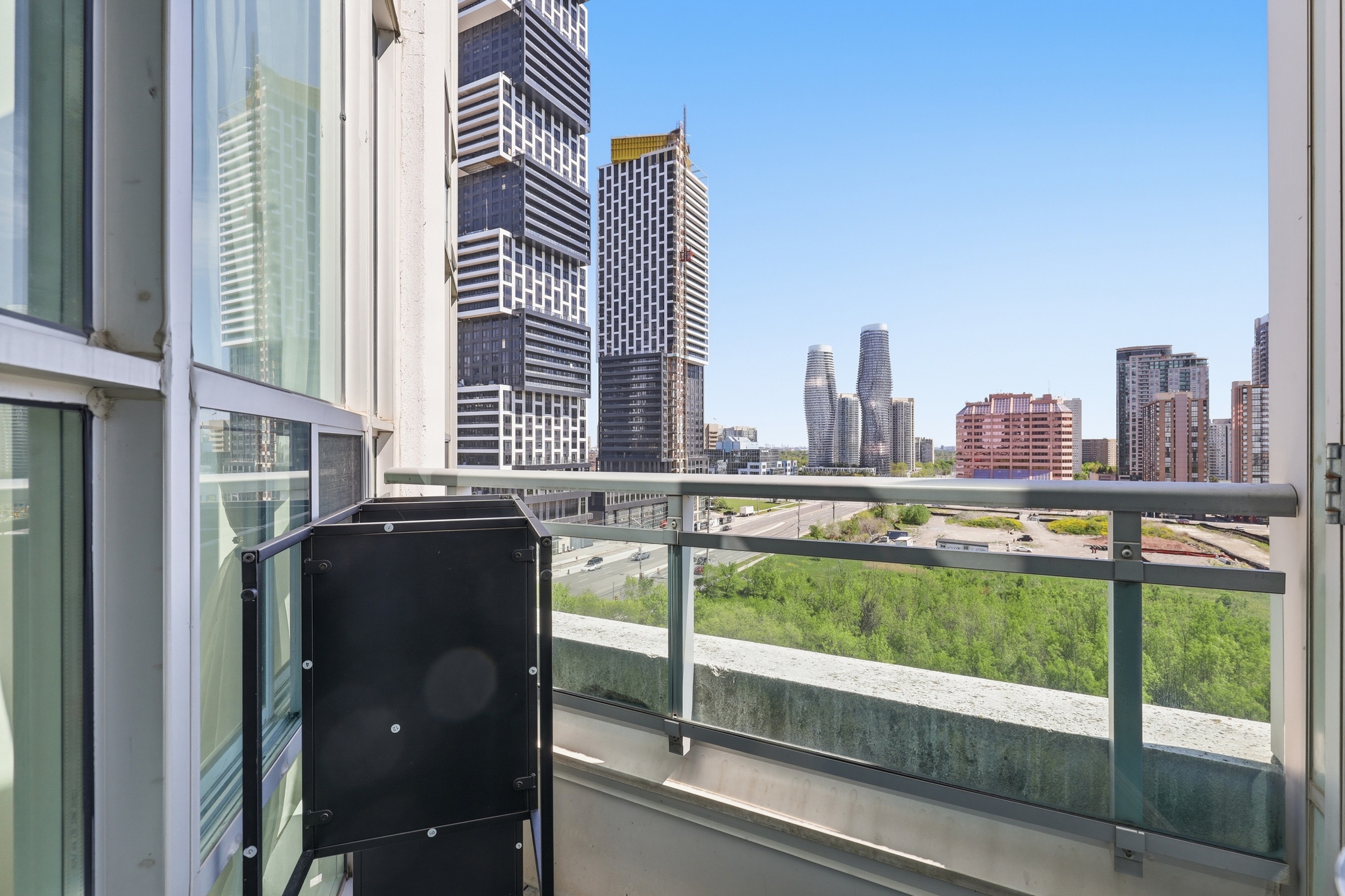 Toronto condo balcony with city skyline view